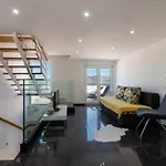 Moderne Mit Gartennutzung- Einem G By Interhome *